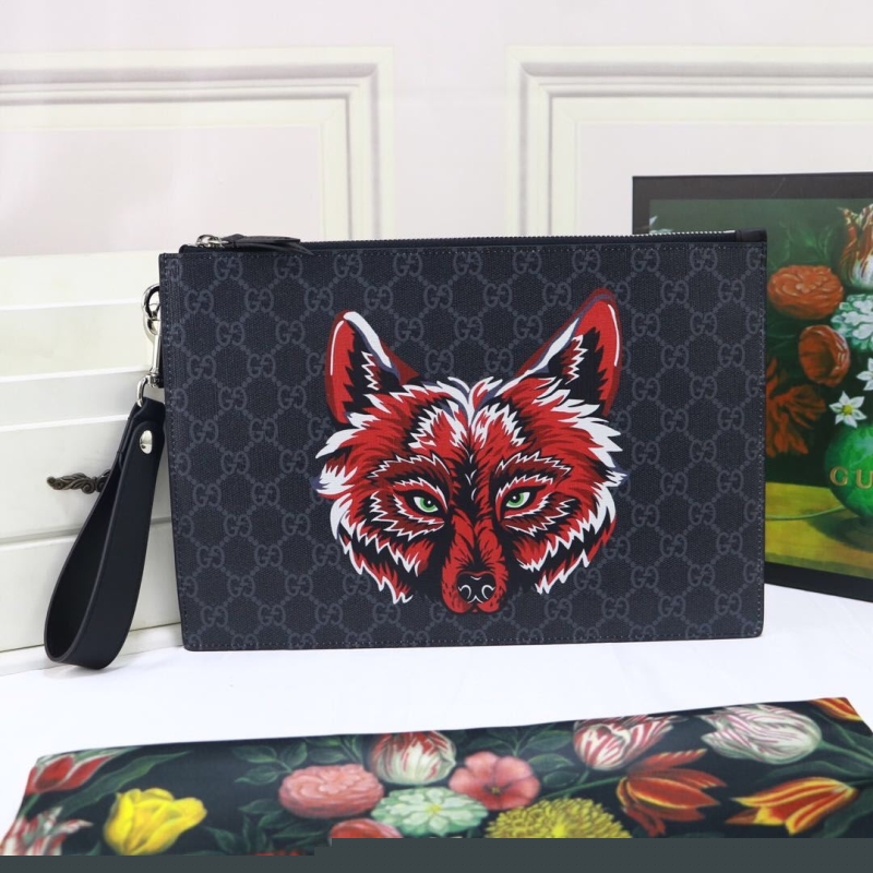 G*u*i clutch bags